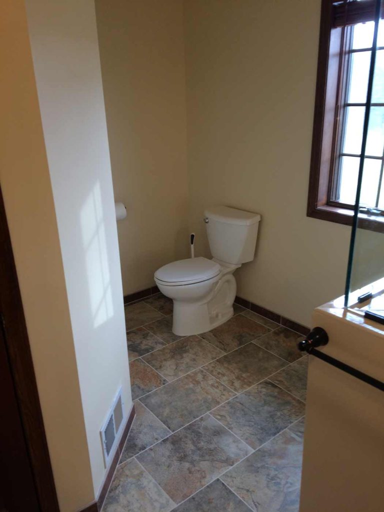 bathroom-remodel-li-corner-toilet